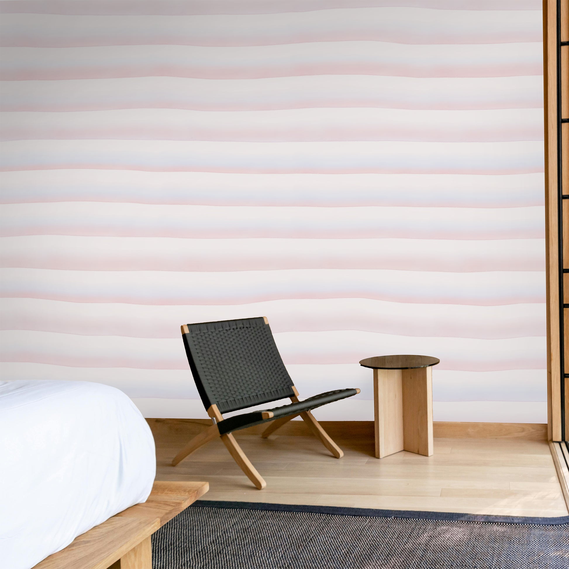 The Terra Mural: A wallpaper mural featuring sophisticated horizontal watercolor stripes inspired by rammed earth walls.  